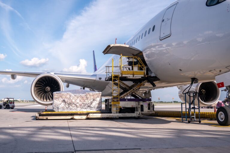 Air,Cargo,Logistic,Containers,Are,Loading,To,An,Airplane.,Air